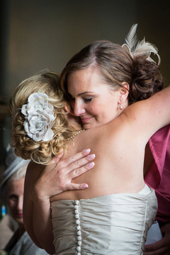 bridesmaid hugs bride at wedding www.oliviabrabbs.co.uk