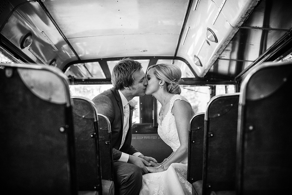 bride and groom on vintage bus www.oliviabrabbs.co.uk