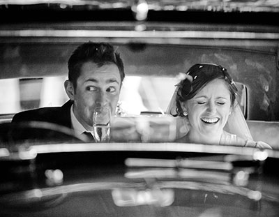 wedding photography at allerton castle near harrogate of bride and groom in wedding car